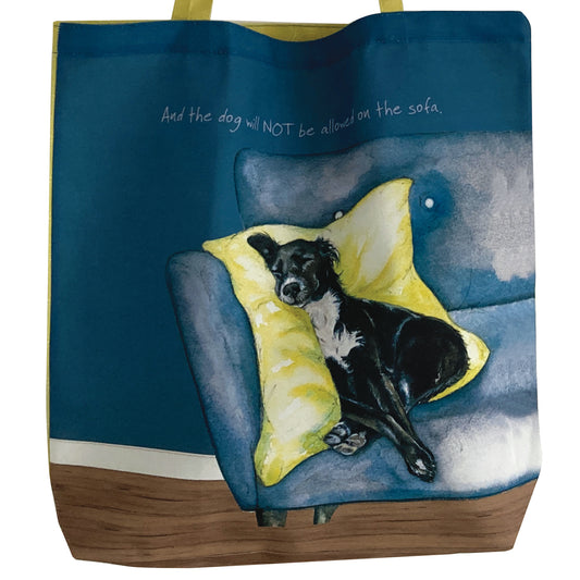 The dog and sofa tote bag