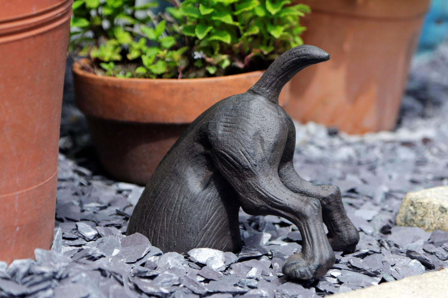 Digging dog garden ornament
