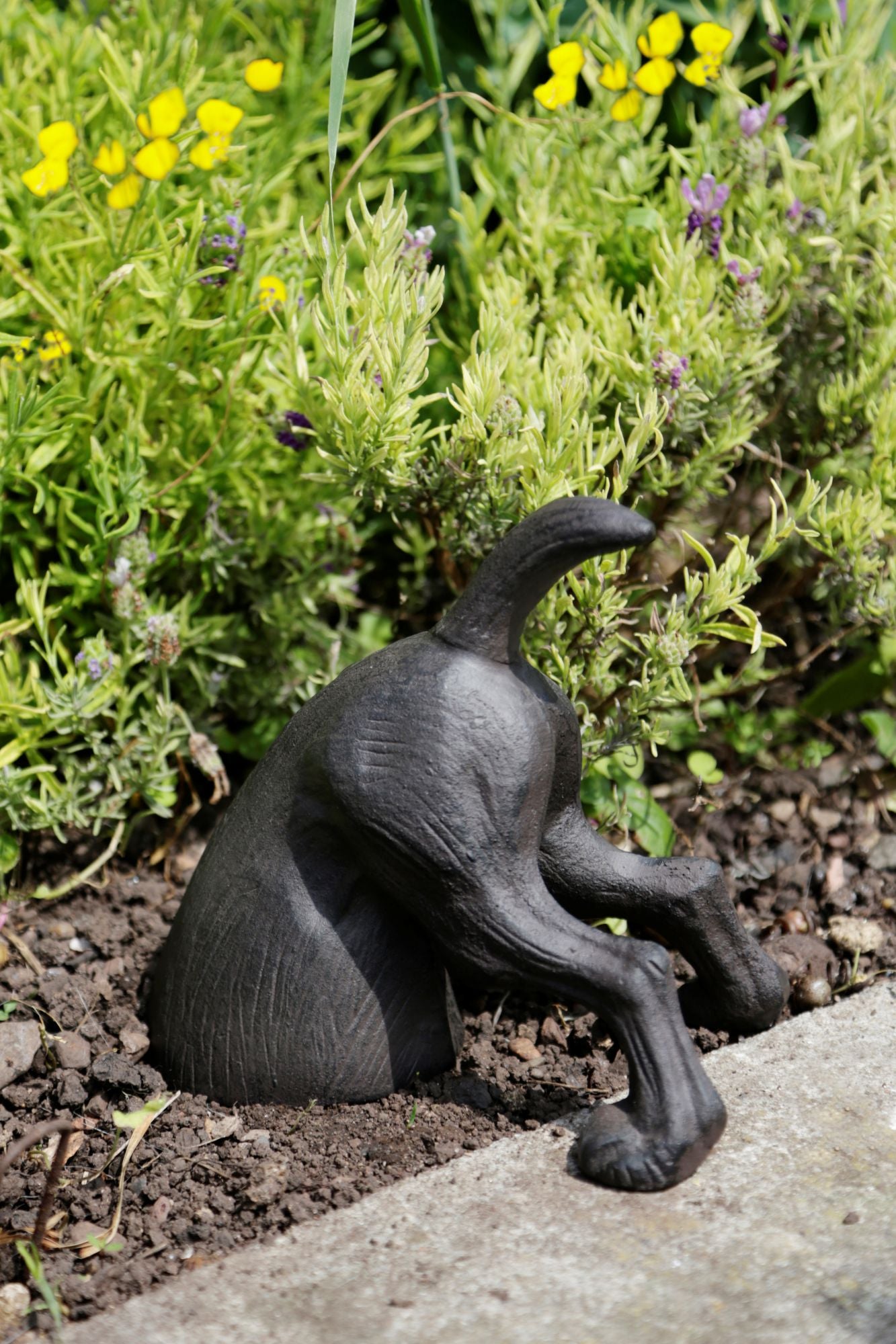 Digging dog garden ornament