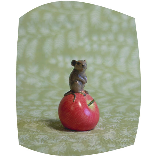 Mouse on apple decoration