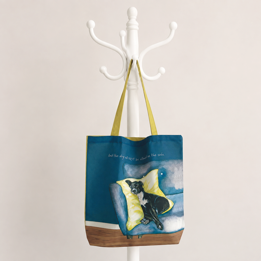 The dog and sofa tote bag
