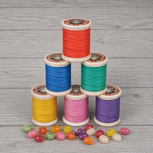 Cotton reel tin with jelly beans