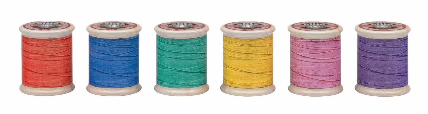 Cotton reel tin with jelly beans