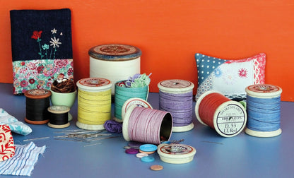 Cotton reel tin with jelly beans