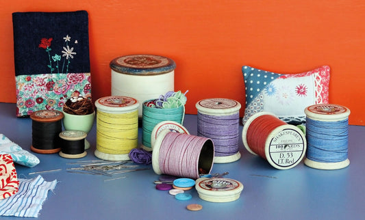 Cotton reel tin with jelly beans
