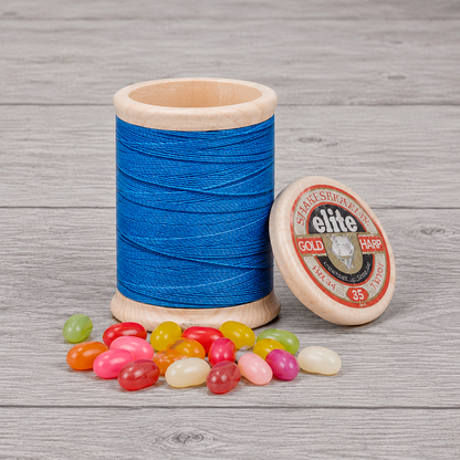 Cotton reel tin with jelly beans